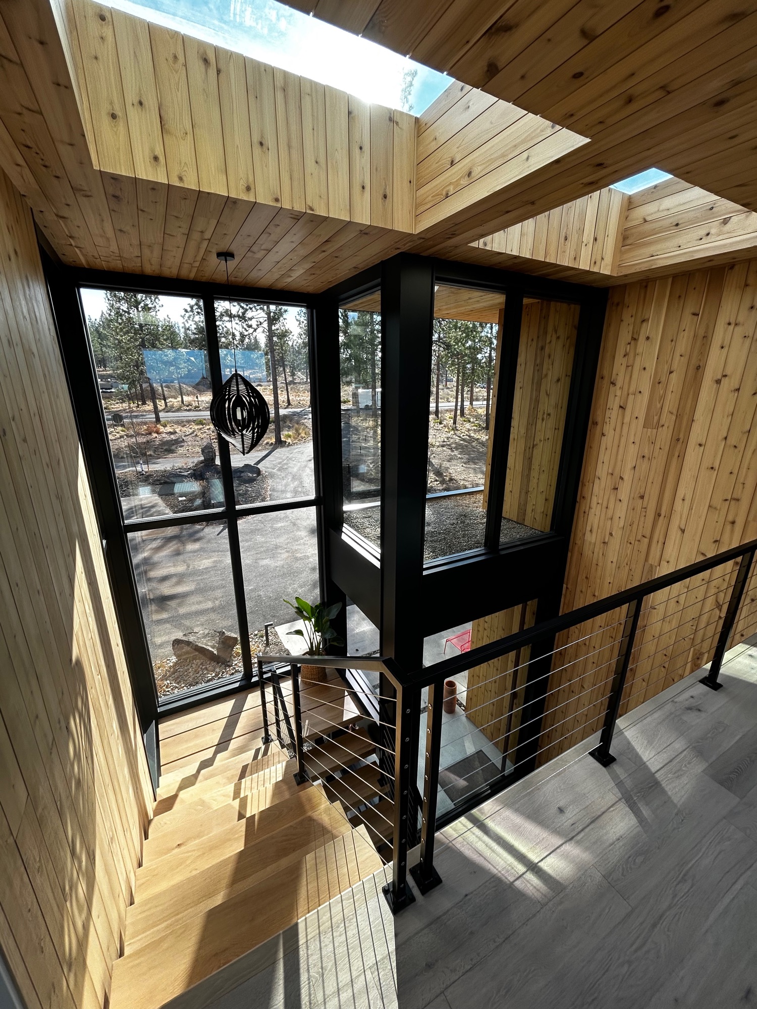 Custom wood stairway with clean modern railing detail