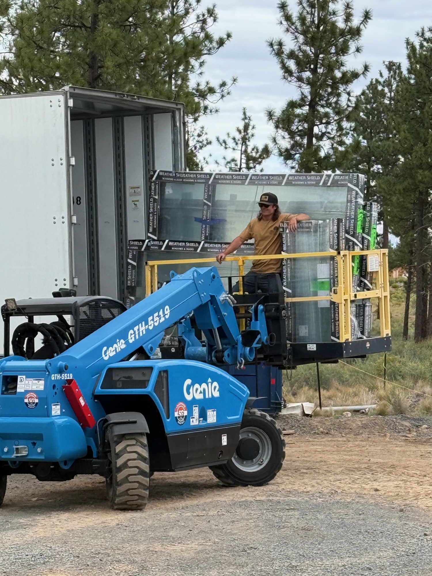 Large custom windows staged for installation on site